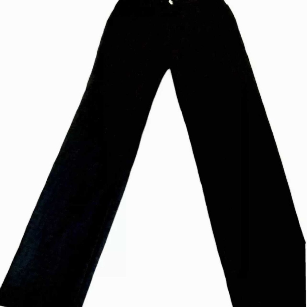 Monogrammed black stretch jeans. Condition is pre-owned